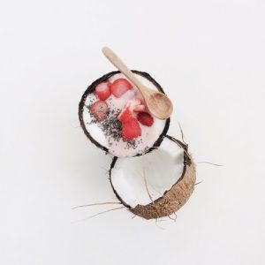 yogurt and berries in coconut