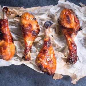 Chicken drumsticks in paper